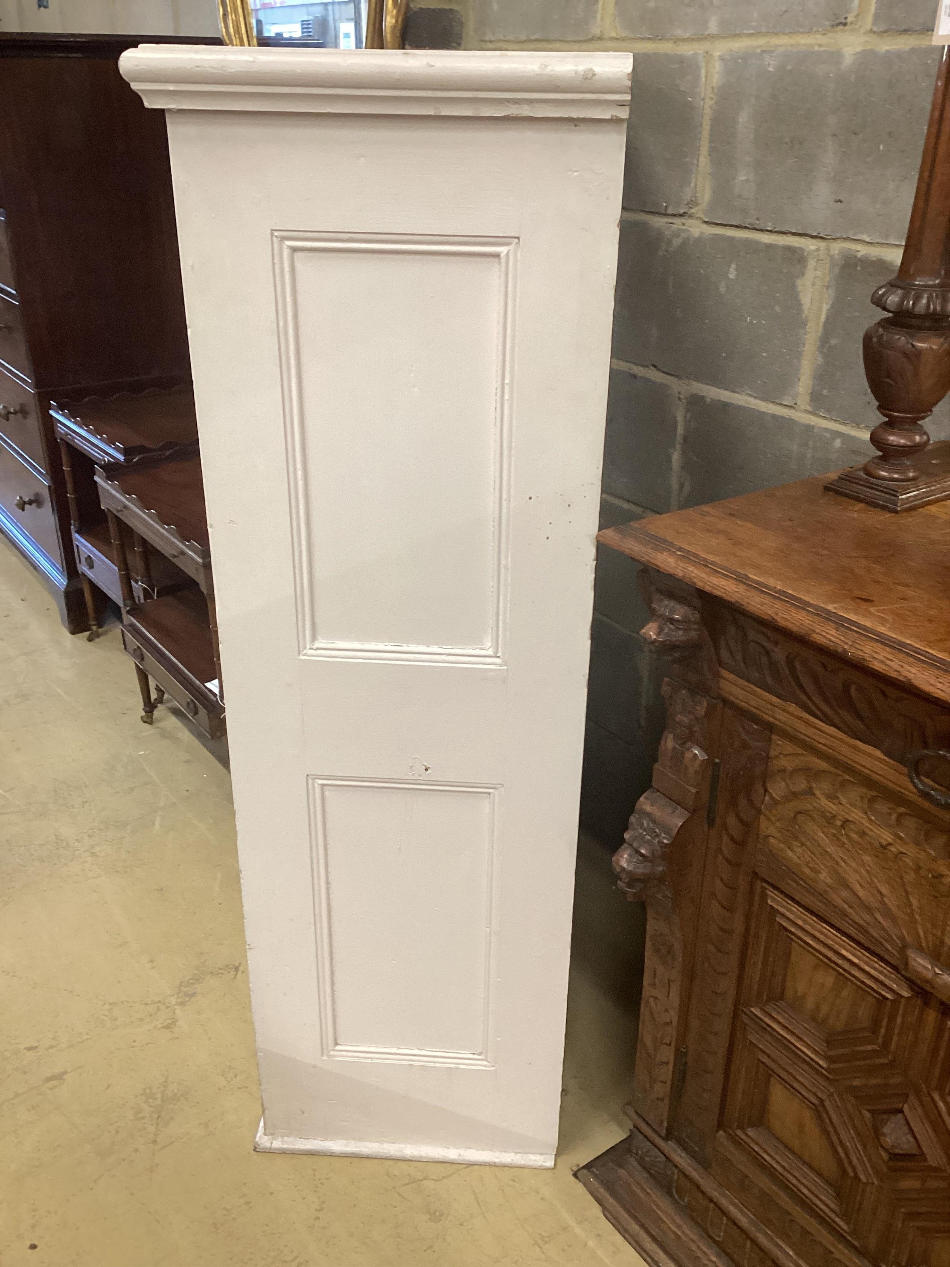 A Victorian painted pine panelled cupboard the interior with three shelves, width 86cm, depth 43cm, height 135cm. Condition - fair